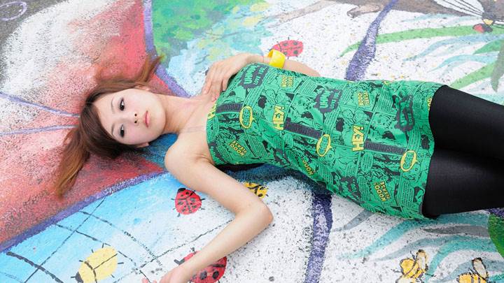 Asian Girl Laying On Sketchy Colorful Ground
